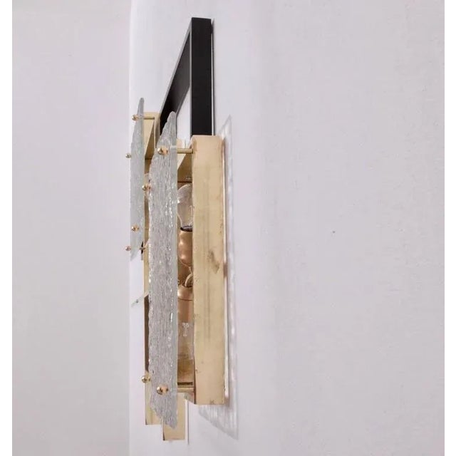 Very huge and impressive wall lamp or sconces sculptures made of brass, metal and Murano glass. The lamps are in good...