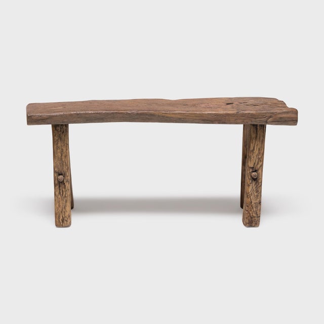 Made of wood reclaimed from 18th-century Chinese buildings, this petite bench brings the farmhouse aesthetic to...