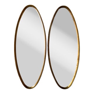 1960s Italian Hollywood Regency Gilt Wood Oval Wall Mirrors – A Pair For Sale