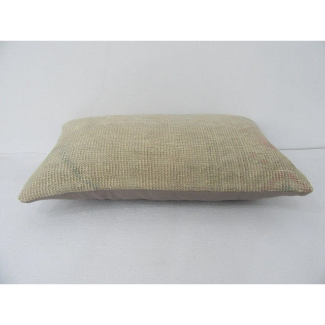 Decorative pillow cover made from a vintage Turkish handknotted rug. Backed with good quality cotton fabric. Pillow...