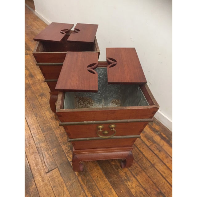 Pair of vintage pagoda design rosewood tables. Two zinc liners, perfect for wine coolers. Each with metal label and Hong...