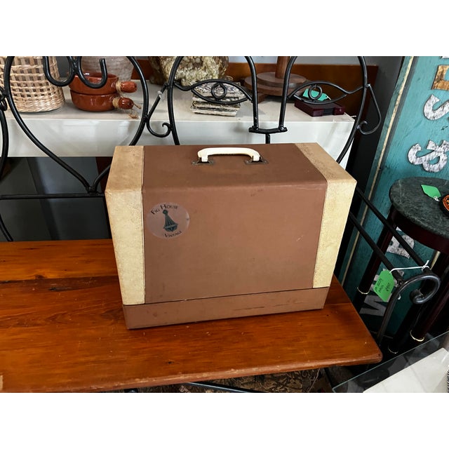 Up for consideration is a vintage working Singer sewing machine and cover. This is such a cool find and would be a great...