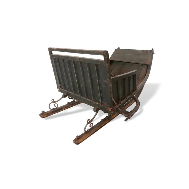 Antique Hungarian walking sled dating back to the early 1900s, the black color makes it elegant and timeless. Amazingly...