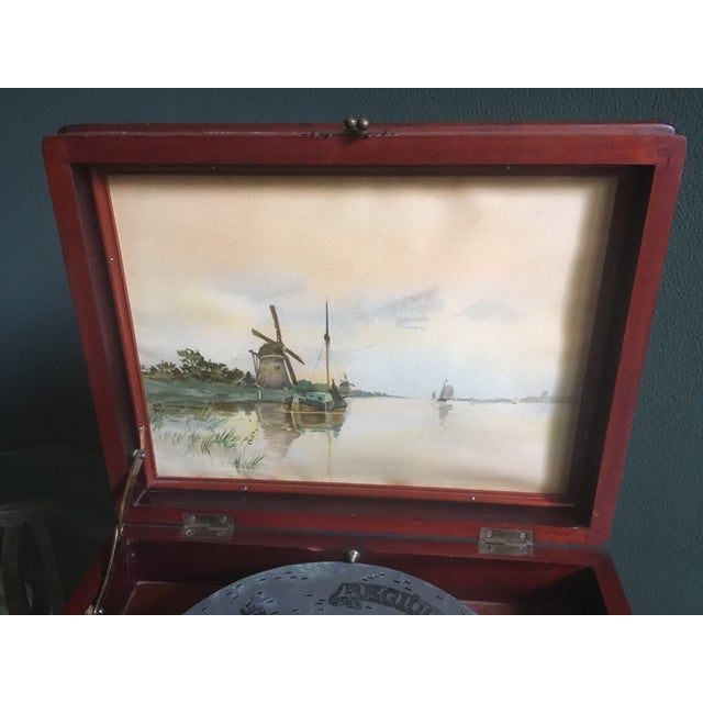 This beautiful Regina music box was our grandmother’s pride and joy because it had been her mothers pride & joy. Circa mid...