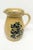 A vintage Pfaltzgraff salt-glazed pottery inspired 2 1/2 quart pitcher featuring a blue bird and flowers motif. This piece...