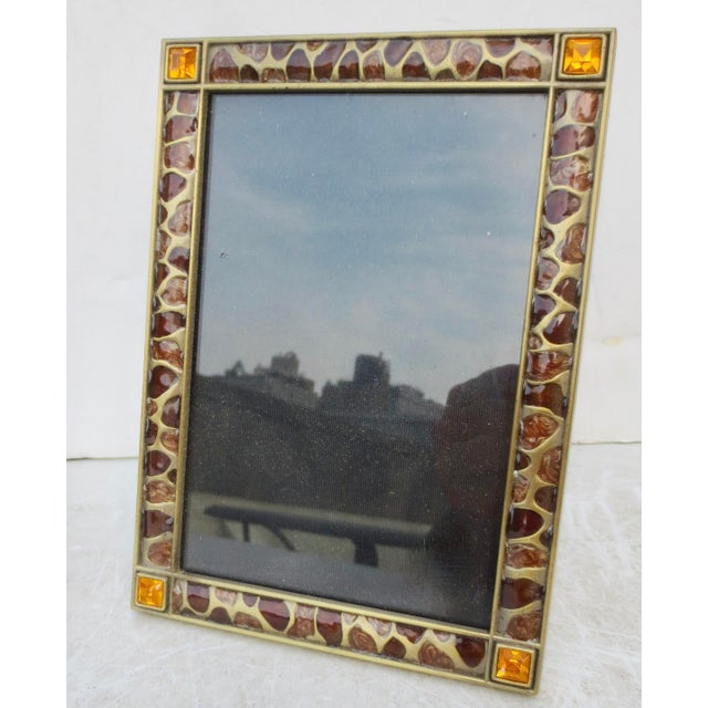 Nicola Miller design frame, a faux animal pattern with rhinestone settings and freeformed enamel design. Linear and clean...