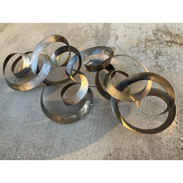 Curtis Jere Steel Hanging Circles Sculpture, Titled "Continuity". Circa 1980s. Good overall condition with some scuffs and...