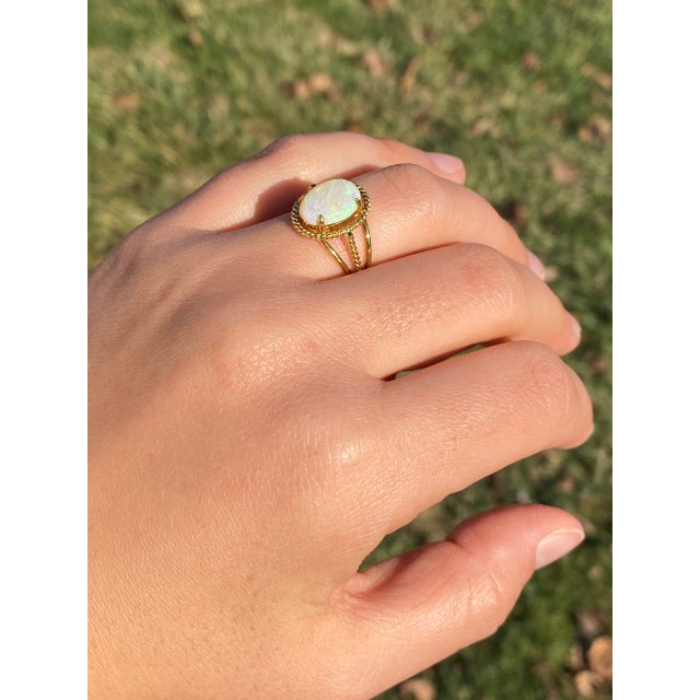 The 150th Avenue: Australian Opal Cocktail Ring in Yellow Gold. Indulge in midcentury charm with this delightful ring...