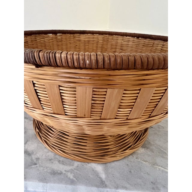 This centerpiece basket is so unique. The pedestal base and woven inlay design adds so much dimension and texture. This...