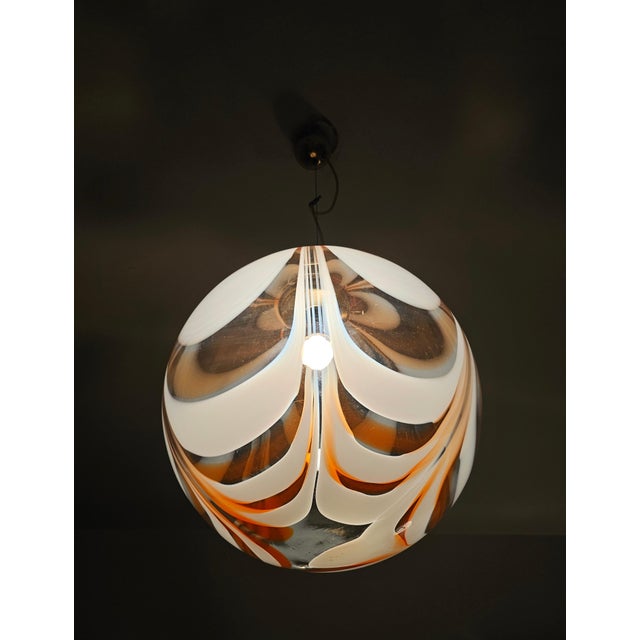 This listing features an exquisite, extra large pendant, done in Murano glass. This pendant is done out of a single piece...