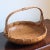 A beautiful mid-20th century handwoven Chinese basket with a rich, warm patina that only comes with age. Gorgeous!