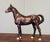 A beautifully aged, vintage cast iron horse figurine, crafted in the mid‑20th century and assembled in the classic...