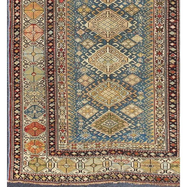 Shirvan Antique Caucasian Rug in Colorful Tones, rug , country of origin / type: Caucasus / Shirvan, circa 1880 This...