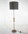 Mid-century floor lamp from Former Czechoslovakia. Made of chrome and wood with step-on switch. The lamp was restored, has...