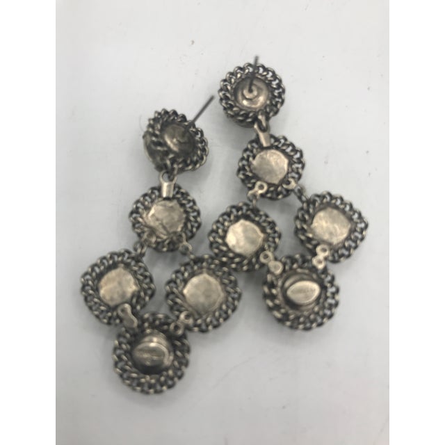 This is part of Chairish’s Costume Jewelry assortment. Stunning Sorrelli earrings from the 1980s with clear, pink, and...