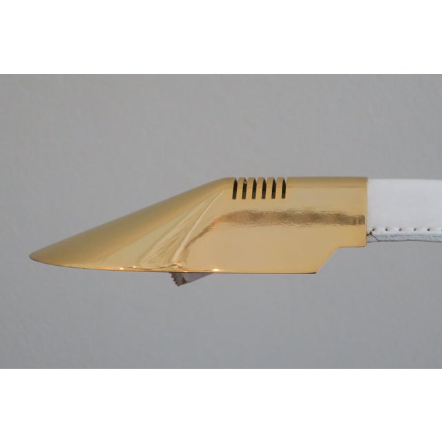 High quality Italian desk lamp in stitched white leather and gilt brass, in the form of a cobra. Inscription underneath....