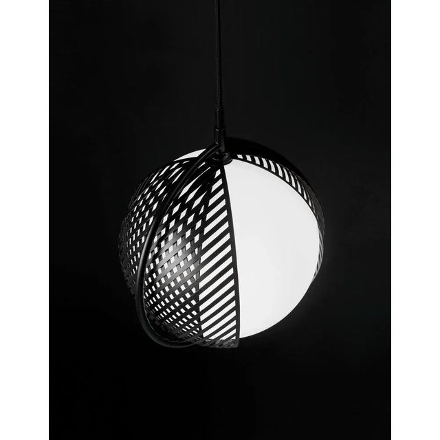 Triple Mondo pendant lamps by Antonio Facco Dimensions: 36.5 x 28 cm (Ø) each lamp Floor lamp with movable metal shades...