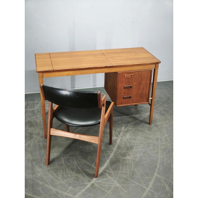 Rare and highly functional Danish modern vanity desk designed by Sven Aage Madsen and crafted in Denmark during the 1960s....