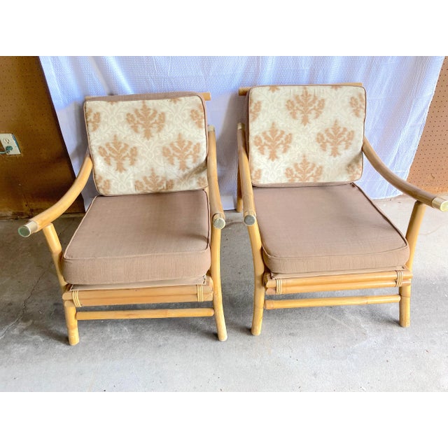 1960s chairs in the style of Ficks Reed. In beautiful condition with the original upholstery that can be changed to your...