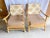 1960s chairs in the style of Ficks Reed. In beautiful condition with the original upholstery that can be changed to your...