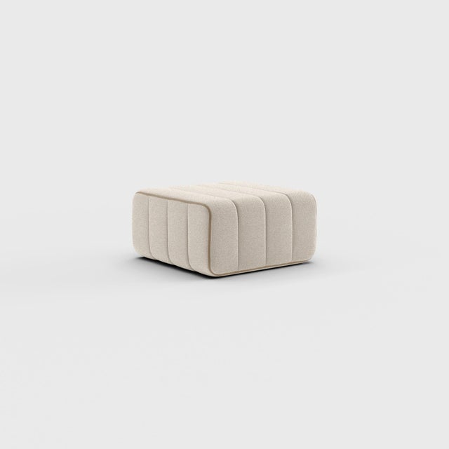 Pouf, stool, ottoman—or simply the building block of what is probably the world’s most flexible sofa system? the curt...
