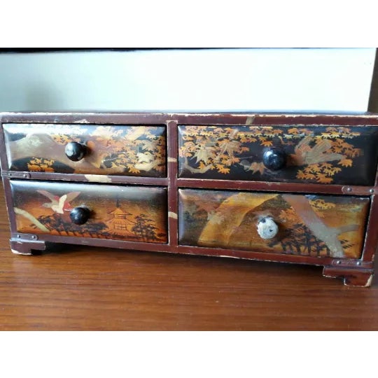 I fell in love with this little box painted with cranes and pagodas. Hand painted with gold details. Very chippy.