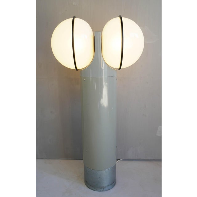 "Totem" outdoor floor lamp, designed by Gae Aulenti for Stilnovo, 1976, Italy. Lamp with two 28 cm diameter opal...