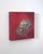 Contemporary Transfiguration by Elena Burykina | Oil on panel Still life of a metallic helmet on a red background For Sale - Image 3 of 5