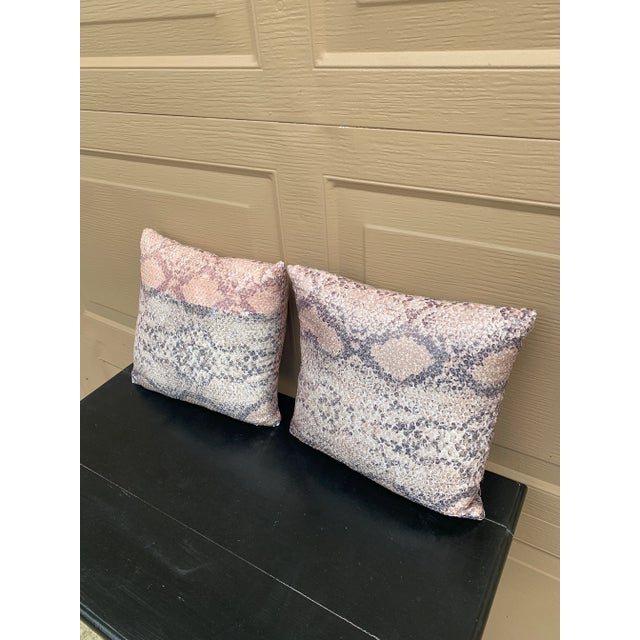 A chic pair of faux snakeskin throw pillows USA, 21st Century Measures: 11"W x 4"D x 11"H. Good vintage condition.