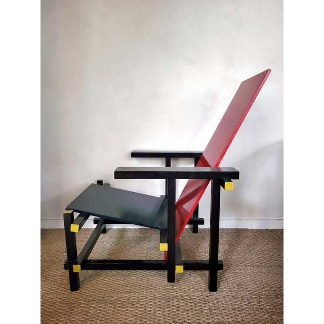 Red and Blue Chair by Gerrit Rietveld, 1980s, in Worn conditions. Designed 1920 to 1949 I have official proof of...