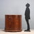 Umbertina sideboard in walnut and walnut burl. Curved front and sides, pair of paneled doors, and bracket feet. Some...