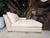 Sophisticated and modern, this contemporary chaise lounge features a taupe leather frame paired with a plush taupe suede...
