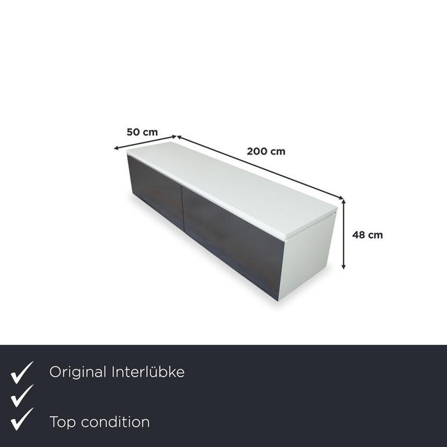 This wall-mounted chest of drawers features a clean, minimalist design. The floating installation, without visible legs,...