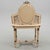 A treasure of exquisite delicacy, this dressing table in cream lacquered wood with gold highlights is a celebration of...