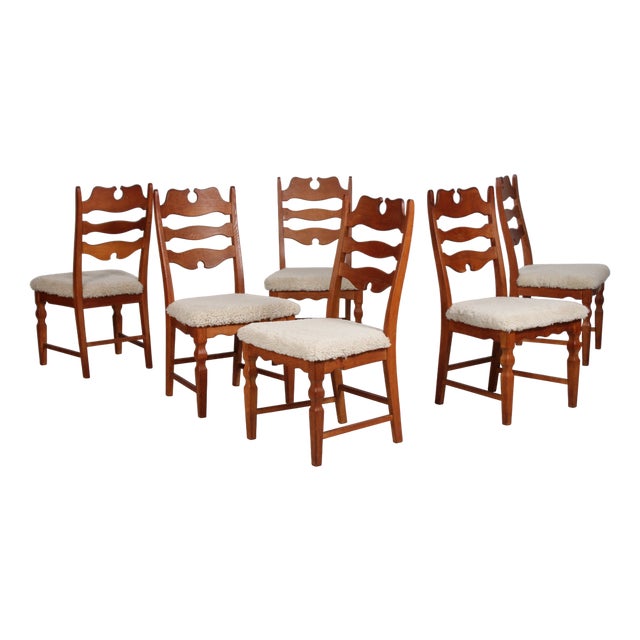 Vintage Danish Chairs in Oak with New Sheepskin by Henning Kjærnulf, 1970s, Set of 6 For Sale