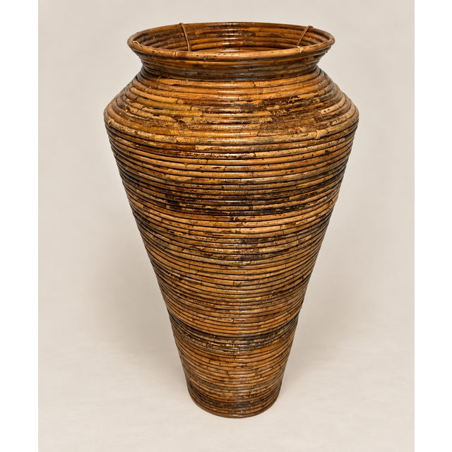 Offered is a stunning vintage Pencil Reed floor vase from an estate in South Florida.