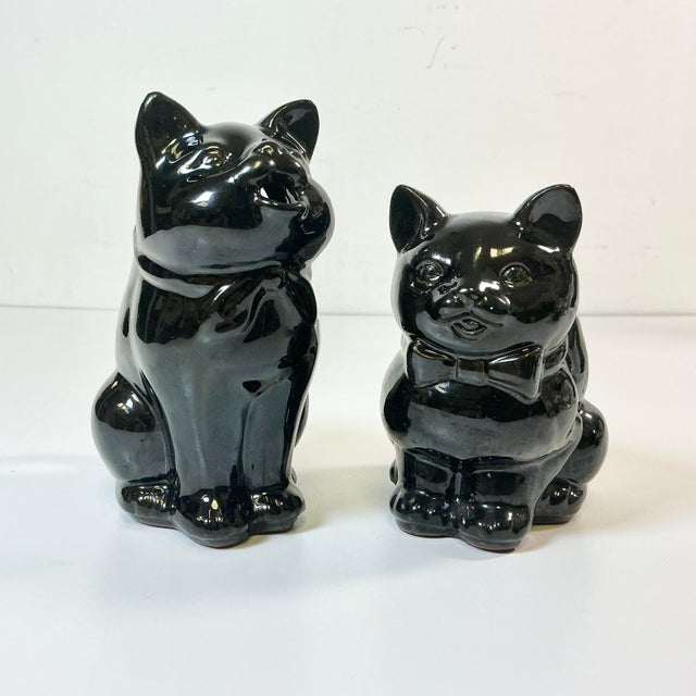 A set of ceramic Black Cats Open Sugar Bowl and Creamer Pitcher. These are from the 1950s and are whimsical as well as...