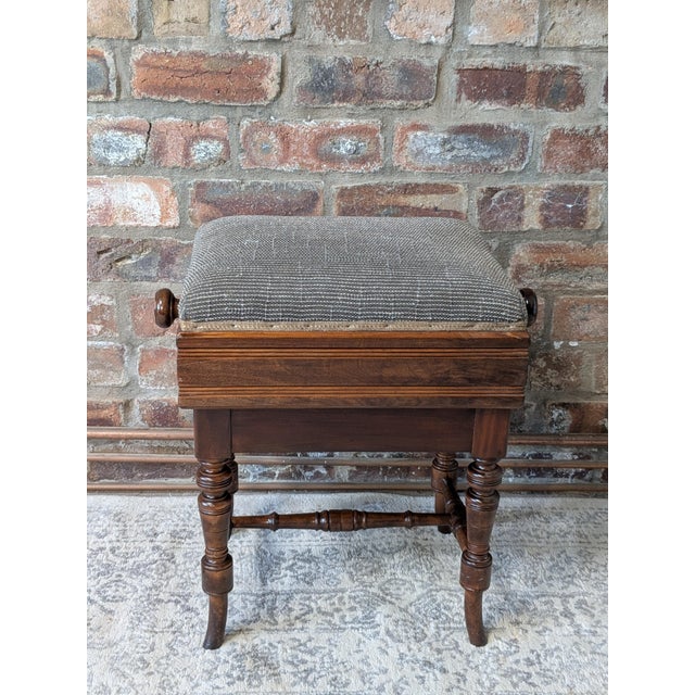 A beautifully crafted late-Victorian rectangular music stool featuring a highly desirable mechanical "rise-and-fall"...