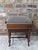 A beautifully crafted late-Victorian rectangular music stool featuring a highly desirable mechanical "rise-and-fall"...