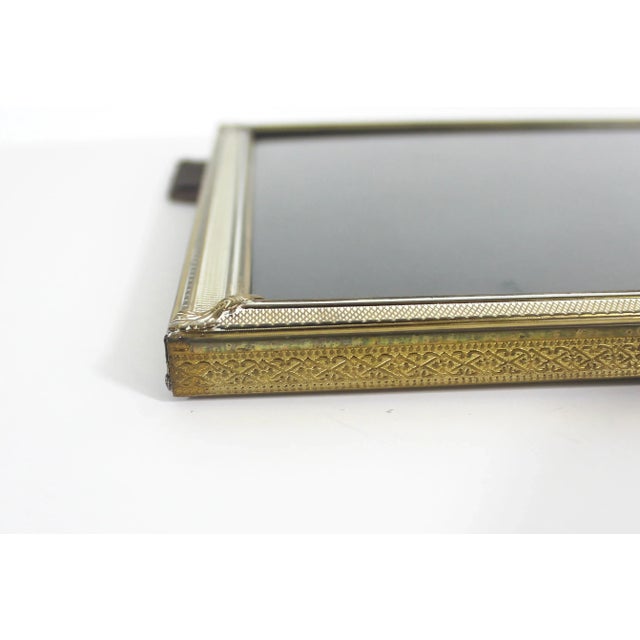 Large 8 x 10 rectangular shaped vintage brass photo frame. Satin easel back for either a horizontal or vertical table top...
