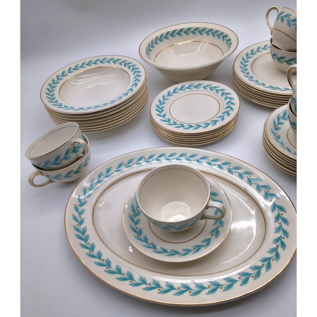 This is a beautiful vintage dinnerware collection featuring the Bermuda pattern by Johnson Brothers (crafted on their...