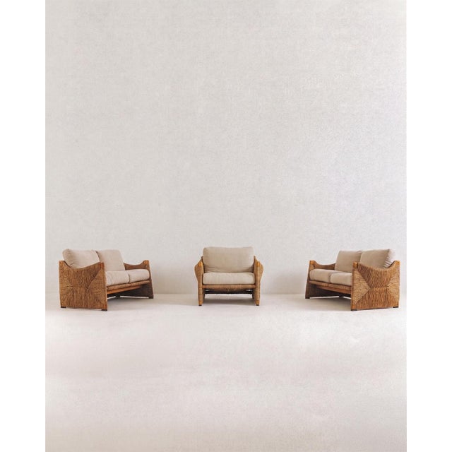 Mario bellini 2 sofas, model 410 “papiro.” and an armchair. Produced by cassina. Italy, circa 1970. wood, braided hemp...