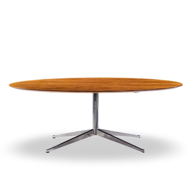Florence Knoll Mid Century Oval Top Rosewood and Chrome Dining Table This dining table measures: 78 wide x 48.25 deep x...