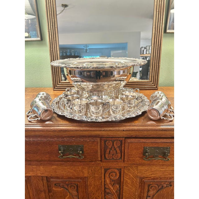 Here we have an impressive vintage silverplate punch service by Sheridan / Taunton Silversmiths Ltd., featuring the...