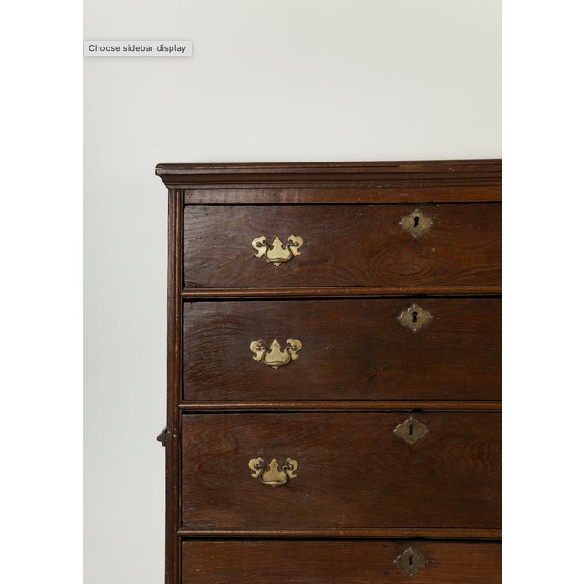 English Georgian period oak campaign chest-on-chest, 18th century, stacking in two parts, having four drawers with batwing...