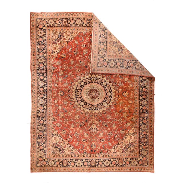 Although recent, this handsome west Persian village carpet shows antique traits in the 32 point, round nested near black...