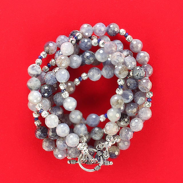 This is part of Chairish’s Costume Jewelry assortment. 21-Inch Two-Strand Faceted Iolite and Lapis Lazuli Necklace This...