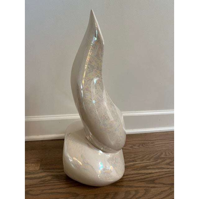 Large Ceramic swirl-like piece. White with an iridescent type finish. A fabulous piece!
