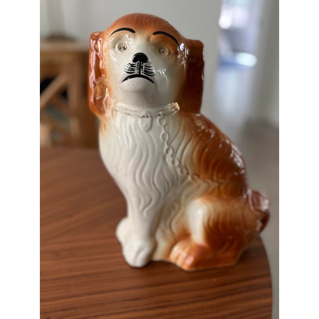 This vintage pup was created by Sadler China in Burslem, England. Also called Wally Dogs, these Staffordshire Spaniels...