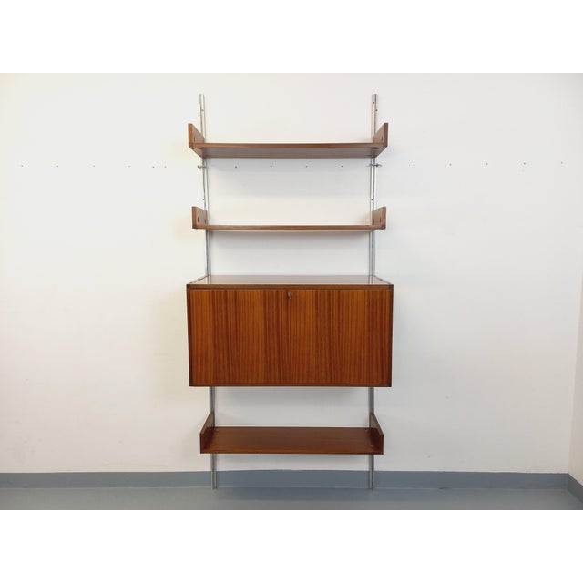 Vintage Scandinavian-style wall-mounted bookcase from the 1960s, in the style of ARP Minvielle by Pierre Guariche, Michel...